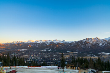 Tatry mountains at blue hour seen from Gubalowka hill in Zakopane. Poland