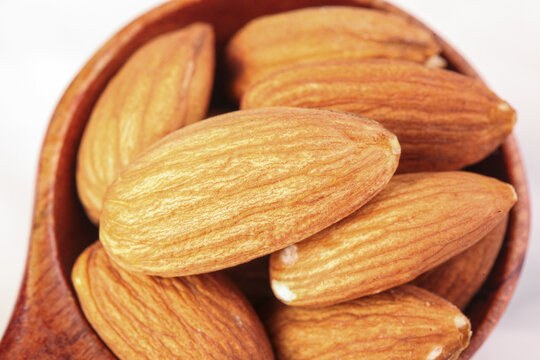 Peeled Almonds in Terracotta Bowl - Healthy Snack and Dried Fruits