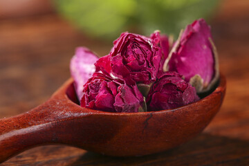 Dried Rose Flower Buds in Wooden Spoon - Traditional Chinese Yunnan Tea Ingredient with Cultural...