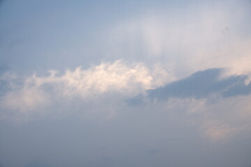 blue sky with scattered white cumulus and wispy cirrus clouds for background, wallpaper, or sky replacement use. Clear weather.