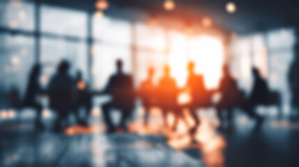 Blurrd silhouette of a diverse business team in a modern office during a meeting