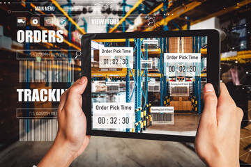 Smart warehouse management system using augmented reality technology to identify package picking and delivery . Future concept of supply chain and logistic business .