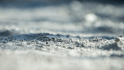 Close up of sand on construction site. Small depth of field.