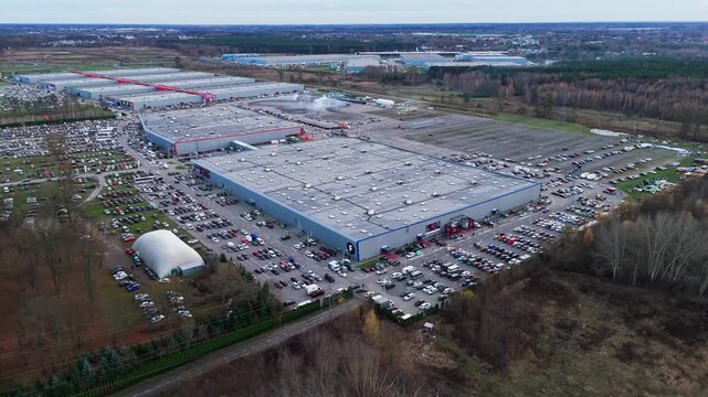 Drone shot of Ptak Warsaw Expo buildings during a cloudy day