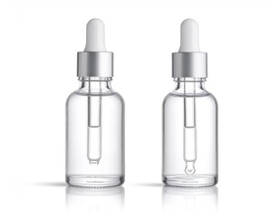 Two Clear Glass Dropper Bottles with Serum or Essential Oil