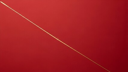 A thin golden line on a red background