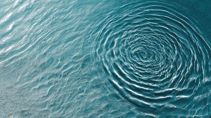 A serene image of water showcasing concentric ripples, creating a calming effect and highlighting the beauty of natural motion.