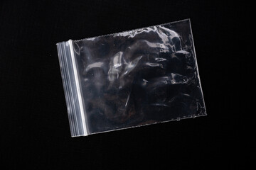 pill wrapper on black background