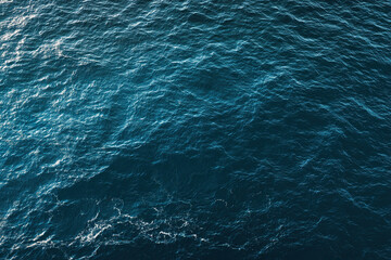 Blue Ocean Water Surface with Waves and Light