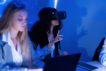 Explore virtual reality technology in a learning environment with students engaging in innovative activities