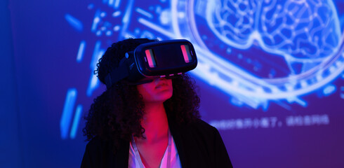 Virtual reality experience in a futuristic setting with a woman exploring digital landscapes