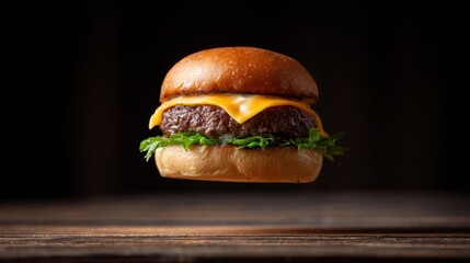 Delicious Cheddar Cheeseburger with Fresh Lettuce on Wooden Table