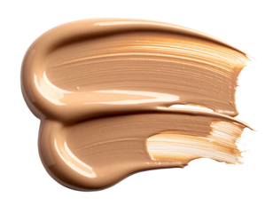 A close-up shot of a smooth, textured smear of creamy beige cosmetic product, isolated on a black background