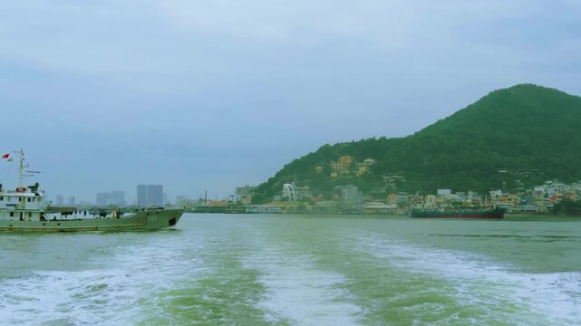 Cargo Barges and Container Ships Transiting Vung Tau River Mouth