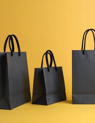 Three black shopping bags on a yellow background