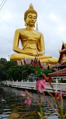 The giant seated buddha statue at the Wat Paknam Phasi Charoen temple, Famous place in Bangkok.
