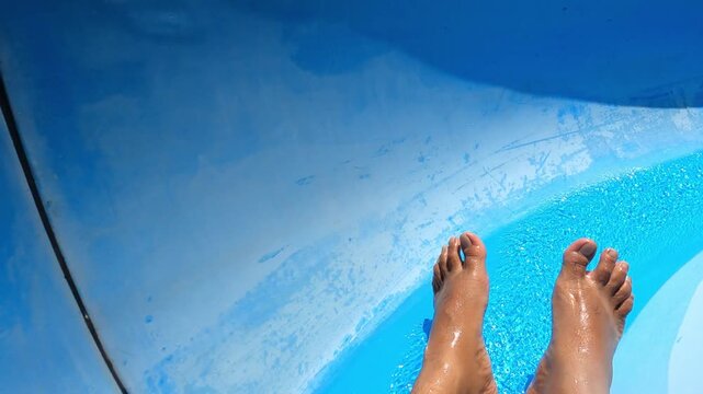 POV Sliding on swimming pool, Java, Indonesia, South East Asia