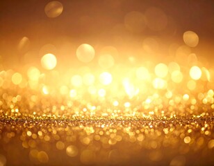 Close-up of golden glitter with bokeh effect and warm light