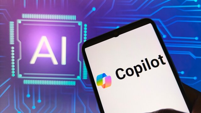 Smartphone displaying microsoft copilot logo against a background of glowing ai circuit board technology