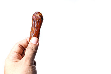 hand holding Dried smoke Bananas