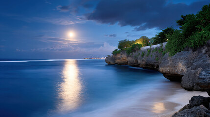 Serene Tropical Coastline at Night with Glowing Horizon and Ocean Shimmering Under Moonlight