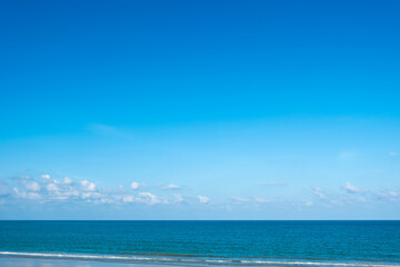 Fototapeta premium Nature clear sky and summer sea water for summer vacation concept.with sunlight of beautiful clouds blue sky with white altocumulus clouds.with 