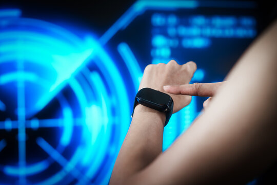 Closeup of modern smartwatch worn on human wrist against futuristic blue motion lights, wearable technology, innovation, connectivity, digital lifestyle, smart health monitoring, interface, future. - Powered by Adobe