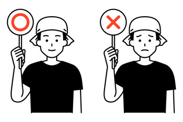 ○&times;マークを掲げる居酒屋の男性店員