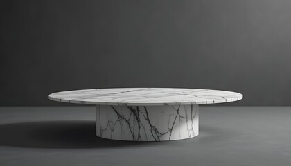 A marble coffee table stands alone on a grey floor against a dark grey background
