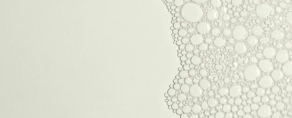 The texture of the foam of shower gel or soap suds or shaving foam. Cosmetic skin care product....