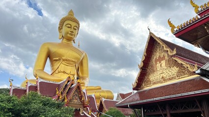 Bangkok, Thailand - September 25 2025 : The giant seated buddha statue at the Wat Paknam Phasi Charoen temple, Famous place in Bangkok.
