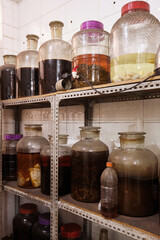 Close-up of traditional Chinese homemade medicinal wine in a glass jar.