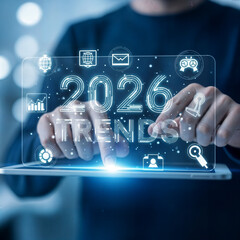 "Business Professional Holding Tablet with Holographic 2026 Trends Data and Technology Icons"
