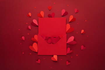 Saint Valentine day background with envelope, paper card blank and red hearts for love romantic message or dating letter.