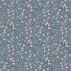 Cute Floral pattern in the small flower. Floral ditsy print. Gentle flower seamless pattern. Pretty mini plants on blue field. Botanical design textile texture. Tiny colorful flowers on blue backgroun