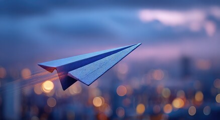 A blue paper airplane flies through a blurry twilight city with bokeh lights