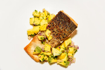 Pan seared Atlantic salmon with mango and avocado salsa