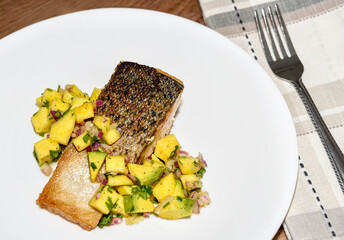 Pan seared Atlantic salmon with mango and avocado salsa