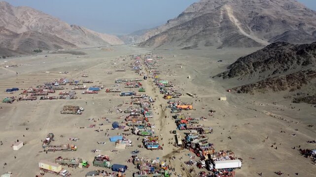 Torkham Refugee camp in mountains for Afghans who have come from Pakistan, Aerial drone, Afghanistan