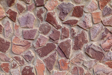 This is stone wall of old European building in sunny day/ This is stone wall texture.