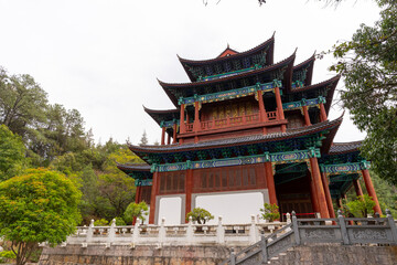 Naklejka premium Beautiful architecture of Dongba Culture Research Institute at Black Dragon Pool Park in Lijiang Old Town, China