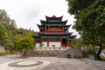 Fototapeta premium Beautiful architecture of Dongba Culture Research Institute at Black Dragon Pool Park in Lijiang Old Town, China