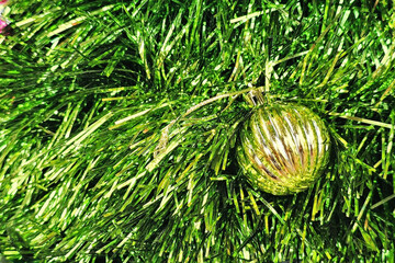 Green and Gold Christmas Ornament in Tinsel.