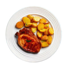 Grilled pork chop and roasted potatoes on a white plate