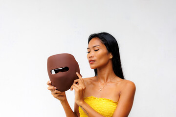 Portrait series of woman interacting with LED facial mask for skincare, beauty tech, and light therapy. Concept of modern wellness and self-care innovation.