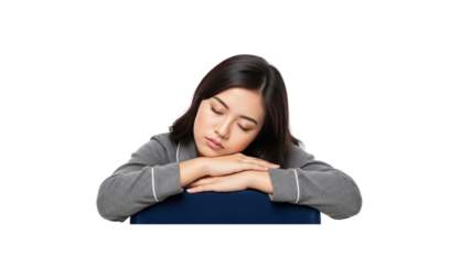 Tired Asian woman sleeping on her arms