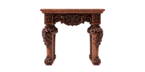Intricately carved wooden table, featuring ornate floral designs, set against a stark black background