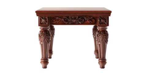 A finely crafted, detailed, and ornate mahogany table isolated on a stark black background