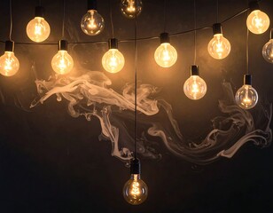 Lit bulbs hang from a wire with swirls of white wispy smoke below