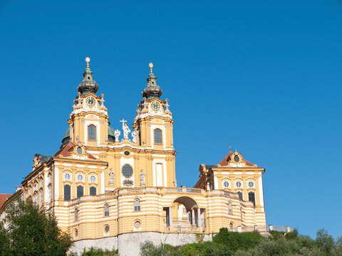 Melk Abbey exterior with baroque architecture under blue sky Austria